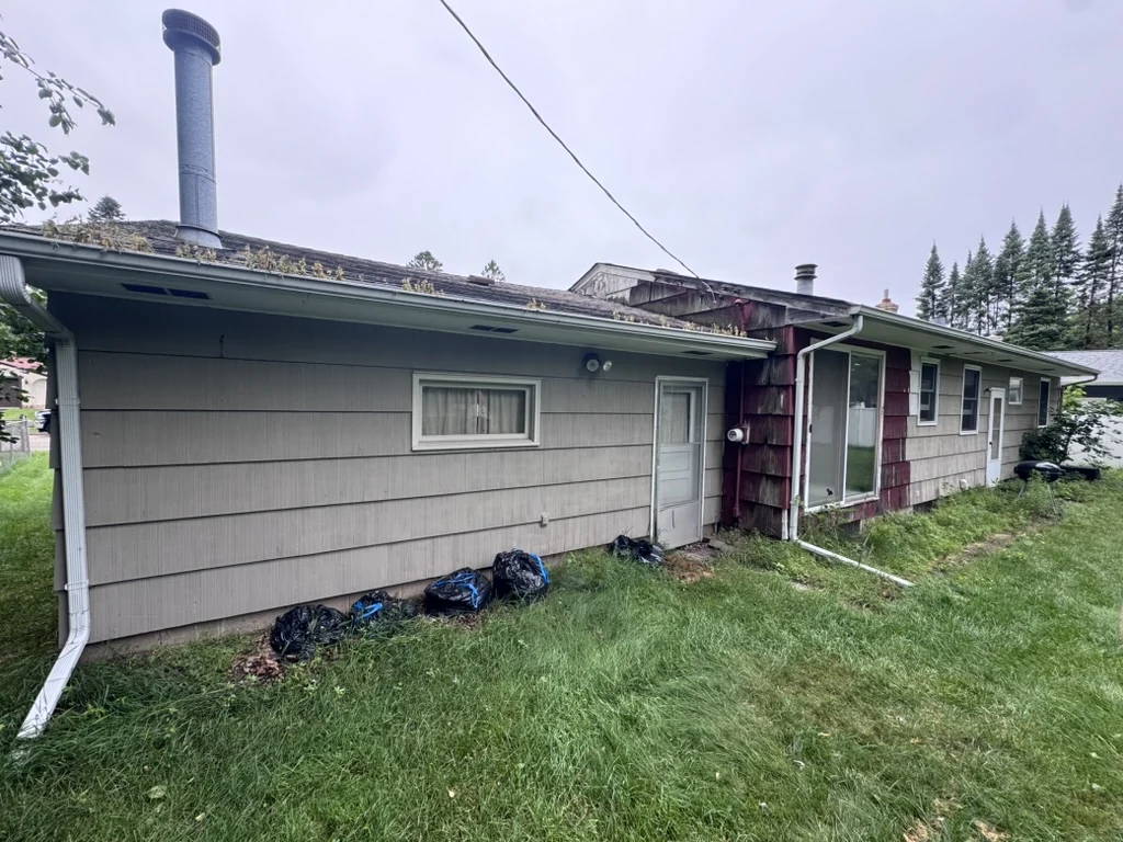 Deteriorated Roof & Siding